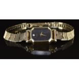 Seiko ladies wristwatch with gold hands, diamond 12 marker, brown dial, gold plated case and