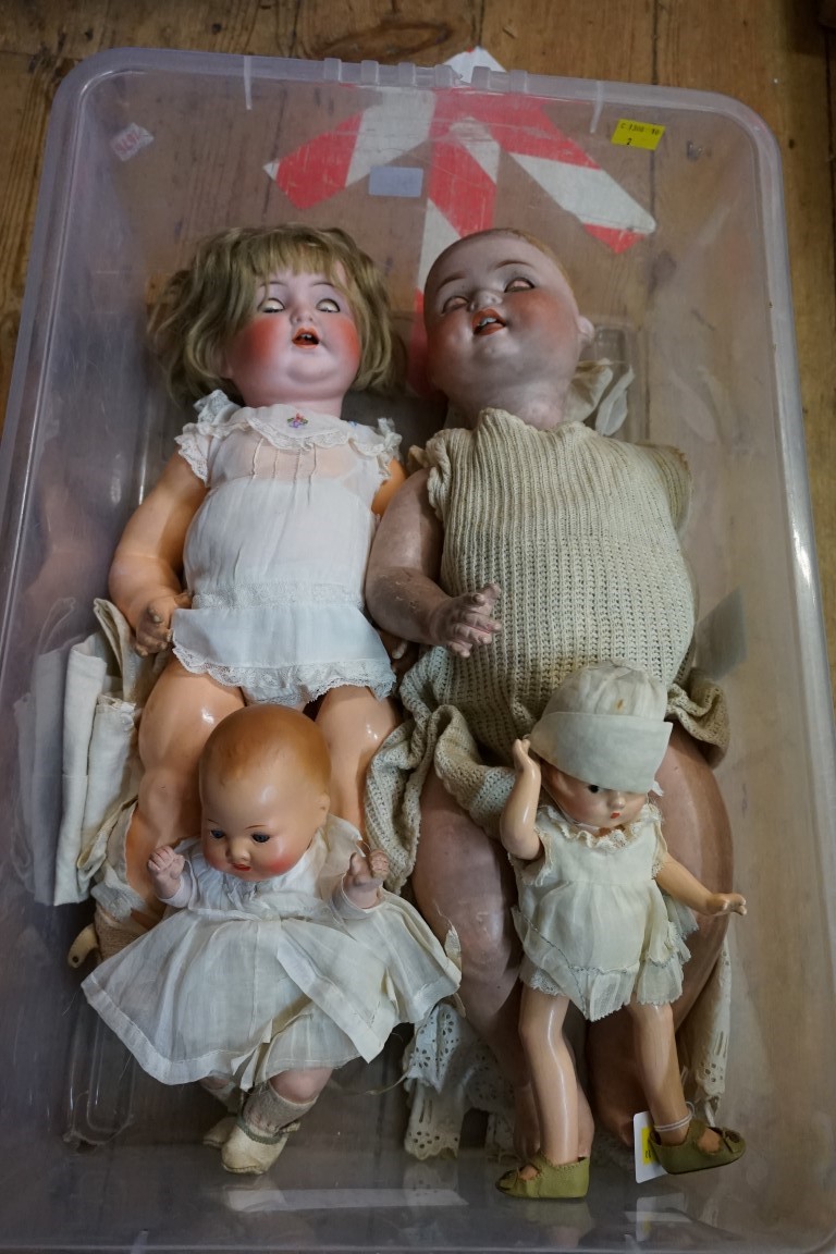 Four various dolls, comprising: a Heubach Koppelsdorf 300-5; a Simon & Halbig 156/8; an Armand