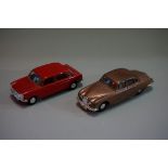 Two Spot-On tinplate cars, comprising: 'Jaguar S-Type'; and 'Austin 1800'. (2)