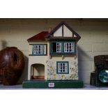 A vintage Triang 'Dolls' House No 23', 42cm high.