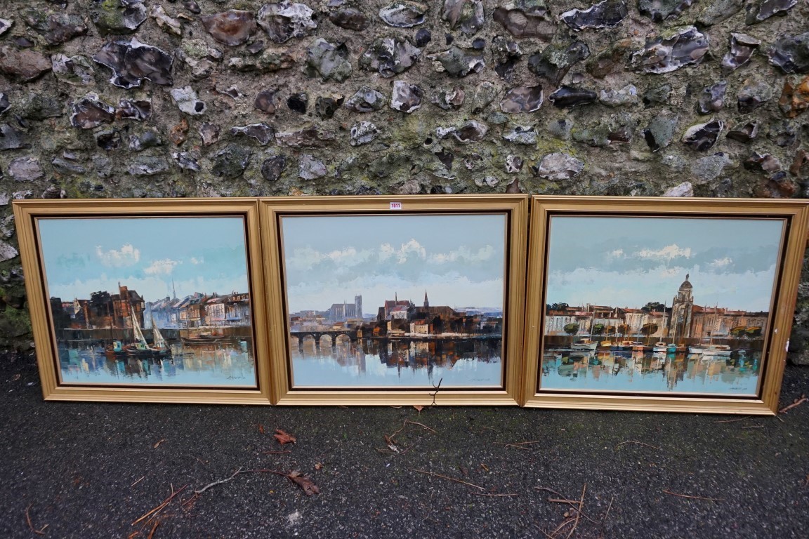 A set of three oils of continental scenes, by Andre Grass.Payment must be made in advance of