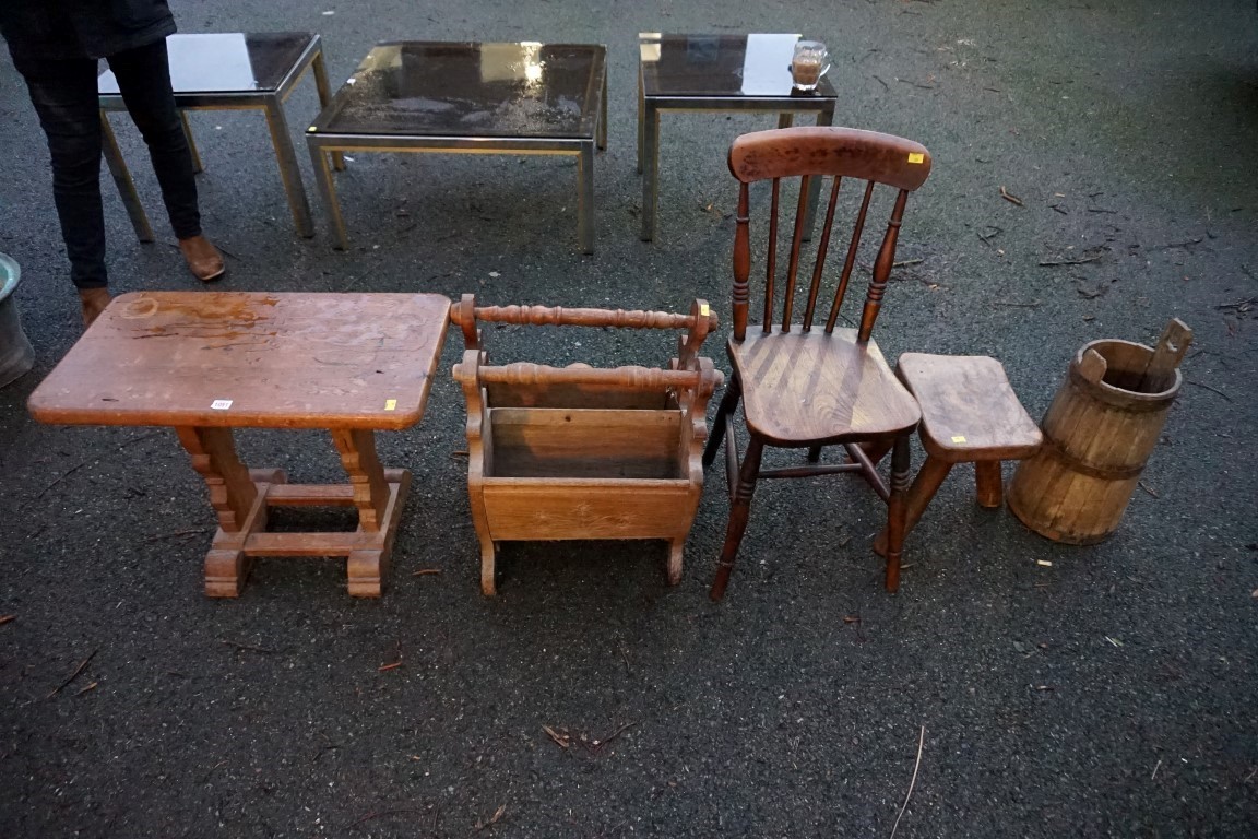 A small wooden table, milking stool, two magazine racks and a chair.Payment must be made in
