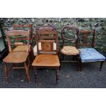 A sundry lot of chairs; to include: a cane seated chair and a kitchen chair.Payment must be made