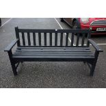 A black painted garden bench, 159cm wide.Payment must be made in advance of collection which is