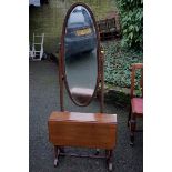 An oak cheval mirror; together with a Sutherland table.Payment must be made in advance of collection