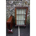 A 1960s mahogany bowfront display cabinet, 126cm high x 60cm wide; together with a reproduction