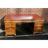 A large 1930s Continental walnut pedestal desk, 148cm wide x 92cm deep. Payment must be made in