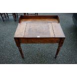 An antique mahogany clerk's desk, 79cm wide x 55cm deep x 80cm high.Payment must be made in