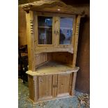 A pine standing corner cupboard.Payment must be made in advance of collection which is strictly by