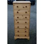 A pine pillar chest, 49.5cm wide x 120cm high.Payment must be made in advance of collection which is