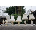 Three pairs of alabaster lamps.Payment must be made in advance of collection which is strictly by