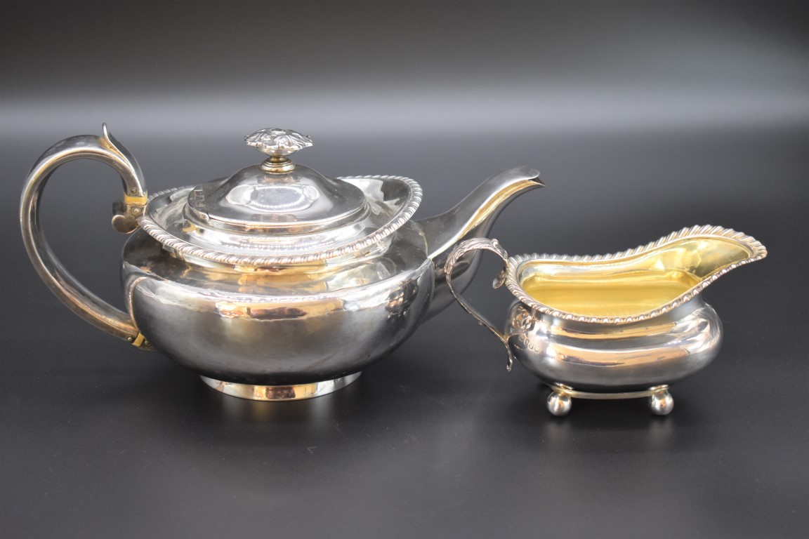 A George IV silver teapot, by Joseph Angell I, London 1825; together with a similar milk jug by