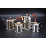 A silver four piece tea set, by Walker & Hall, Sheffield 1945, 1650g all in.