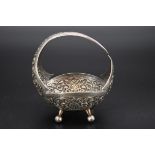 An early 20th century Karachi-Cutch bonbon basket, stamped 'J Manikrai, Karachi, T95', 10.5cm high.