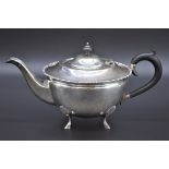 A silver teapot, by Levesley Brothers, Sheffield 1919, 14.5cm high, 670g all in.