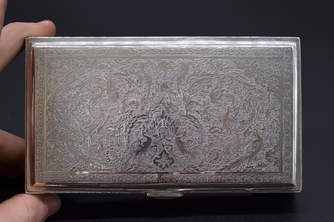 A Persian white metal cigarette box, probably Isfahan, stamped to inner lid, 14cm wide. - Image 2 of 4