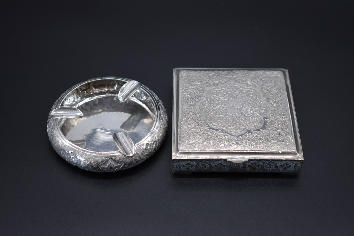 A Persian .84 silver cigarette box, by H P ?, probably Isfahan, 9cm; together with a similar white