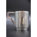 An Art Deco silver christening mug, by Sanders & Mackenzie, Birmingham 1933, 6.5cm, 75g.