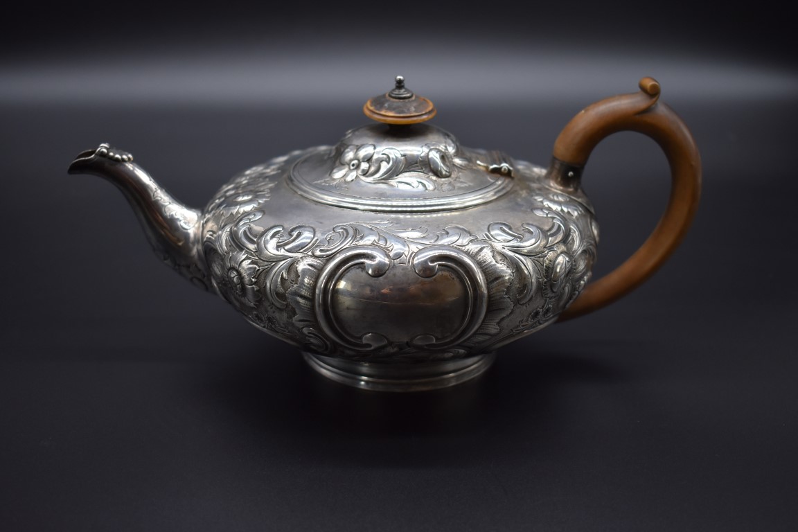 A Victorian silver tea pot of squat form, by Walter Morrisse, London 1856, 645g all in.