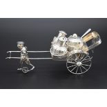 A Chinese silver novelty rickshaw condiment set, by Wai Kee, Hong Kong, stamped 'sterling silver',