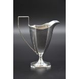 A Victorian silver milk jug, London 1894, 13.5cm, 120g.