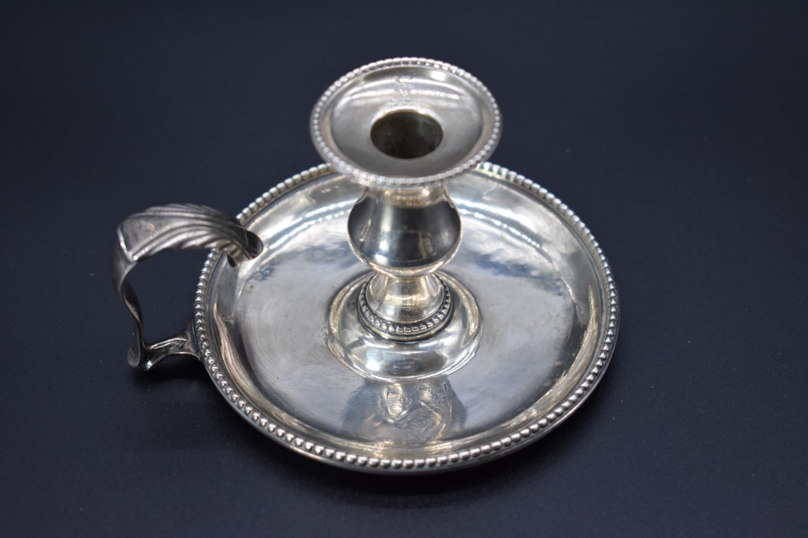 A George III silver chamberstick, by Henry Hubert, London 1778, 9cm diameter, 108g. - Image 2 of 5