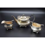 A Georgian style silver composite three piece tea set, by Thomas Edward Atkins and Ernest Druiff &