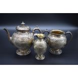 A Victorian silver three piece tea set, by John, Edward, Walter & John Barnard, London 1872 and