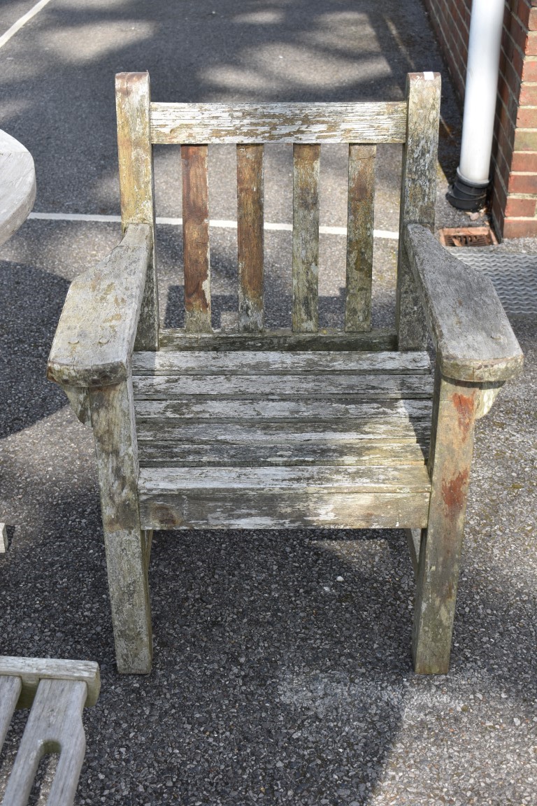 A teak garden table, 181 x 120cm; together with a pair of teak armchairs and a teak lounge chair. - Image 4 of 9