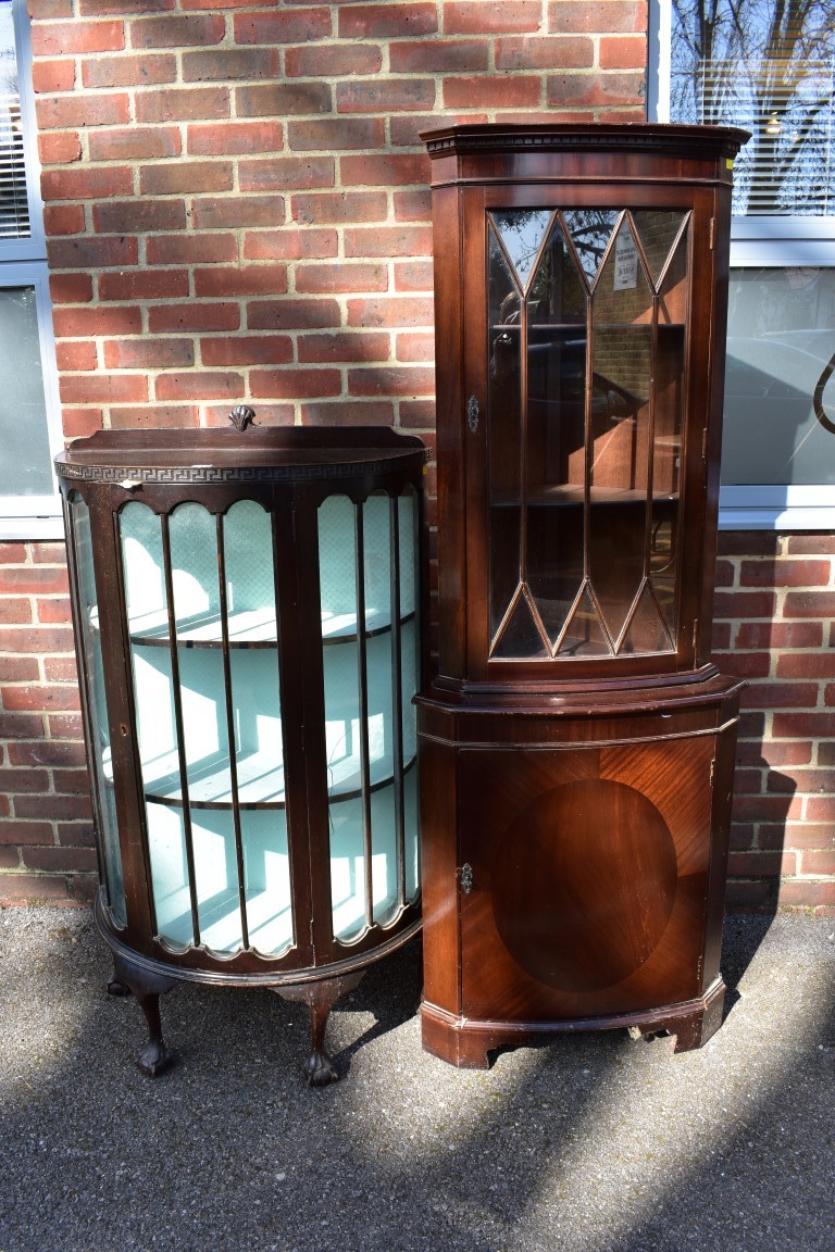 A bowfront display cabinet; together with a reproduction corner cupboard, 180cm high x 66cm wide;