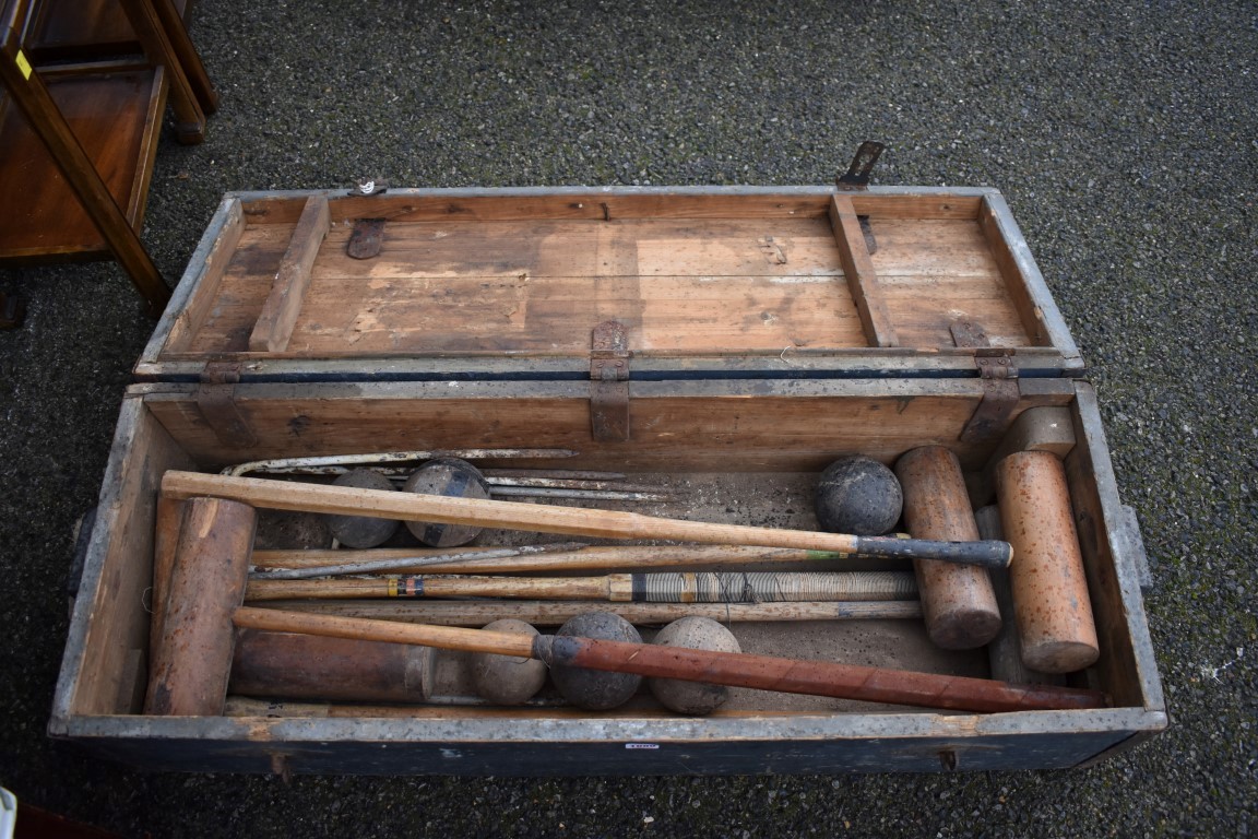 An old croquet set in wooden box.Collection of this lot is strictly by appointment on Saturday