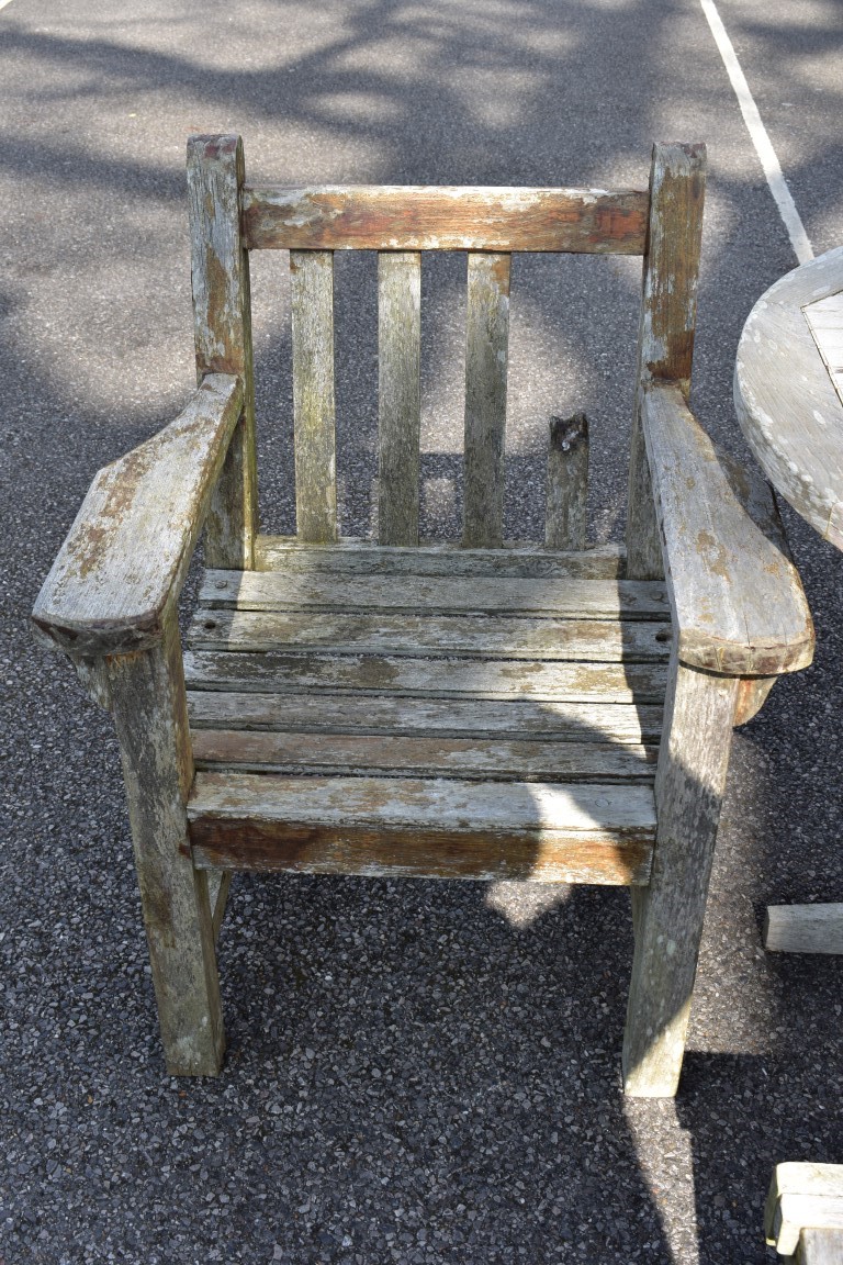 A teak garden table, 181 x 120cm; together with a pair of teak armchairs and a teak lounge chair. - Image 6 of 9