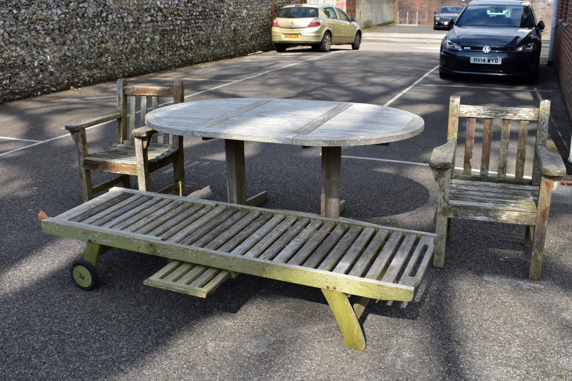 A teak garden table, 181 x 120cm; together with a pair of teak armchairs and a teak lounge chair. - Image 3 of 9