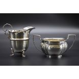 An Edwardian silver twin handled sugar bowl, by James Deakin & Sons, Sheffield 1910, 15cm