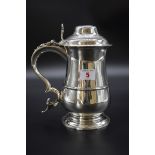 A George III silver lidded quart tankard, by I M, London 1769,