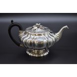 A George IV silver melon shaped teapot, by Paul Storr, London 1827, 925g all in.