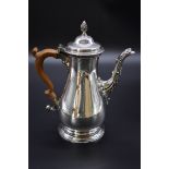 A George III silver coffee pot, by Daniel Smith & Robert Sharp, London 1764, 26cm high, 907g all in.