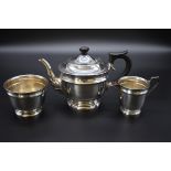 A silver three piece tea set, by Viners, Sheffield 1963, 654g all in.