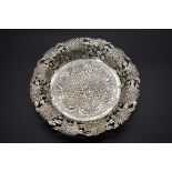 A Chinese silver export dish, by Wang Hing, having pierced Chrysanthemum decoration, stamped '90',