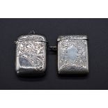 A late Victorian silver vesta case, by Samuel M Levi, Birmingham 1900, 4.5cm; together with