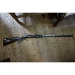 A 19th century percussion rifle, the stock bearing plaque inscribed 'Willis, New Building, Price St,