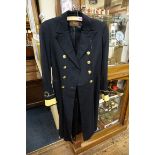 A Royal Navy officer's frock coat, by E J Whitaker of Chatham, 1933.