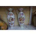 A large pair of Sitzendorf porcelain twin handled vases, 44.5cm high, (s.d. to each).