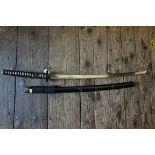 WITHDRAWN FROM SALE A reproduction Japanese katana and scabbard, with stand.