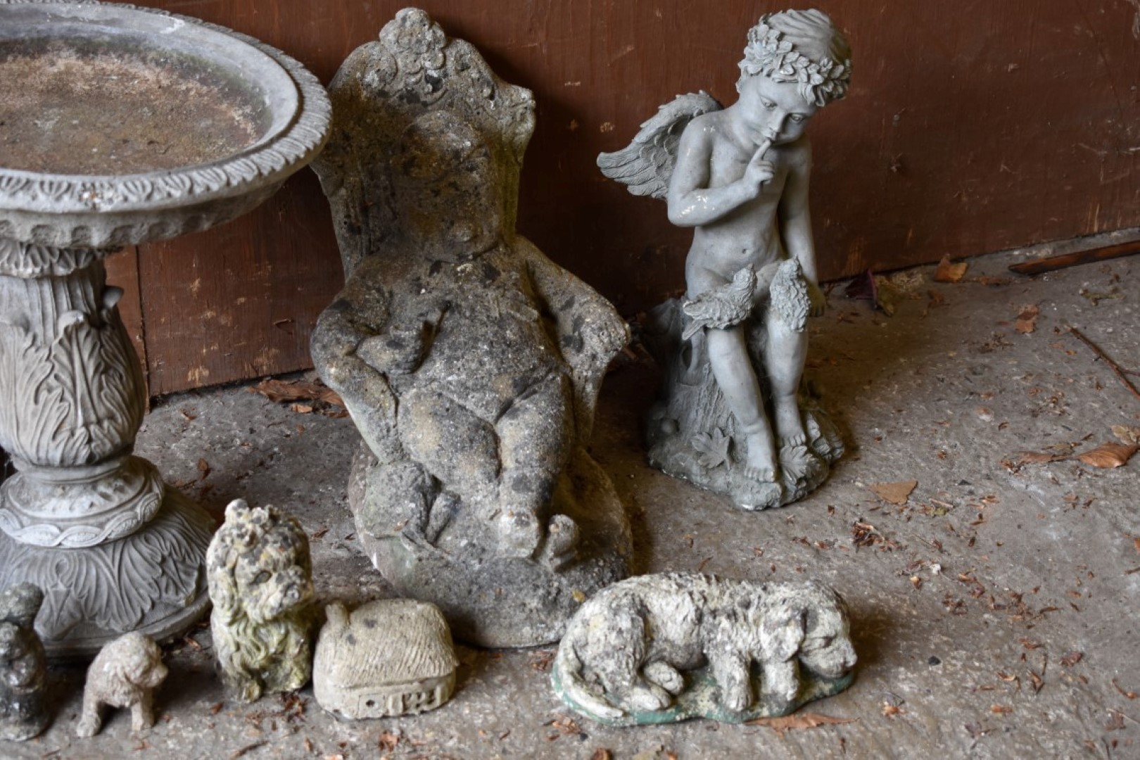 A reconstituted stone planter; together with other garden statuary. - Image 5 of 5