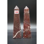 A pair of red marble obelisks, 25cm high, (small shallow chip to one).