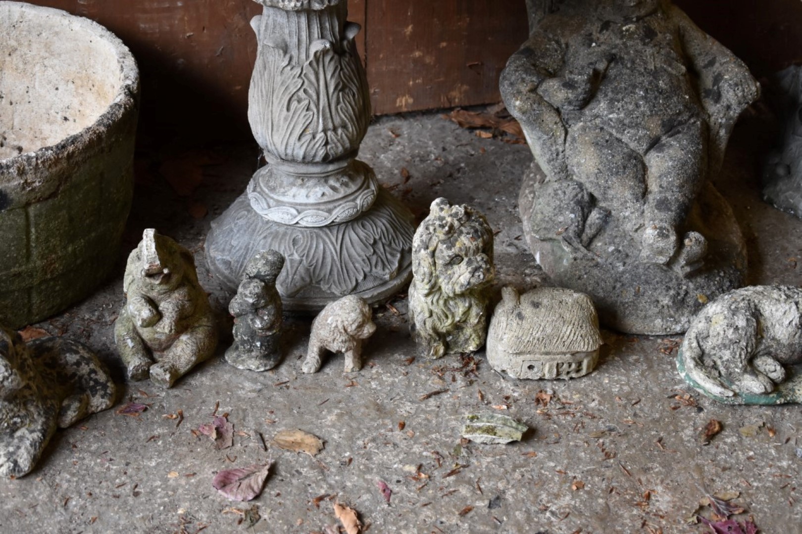 A reconstituted stone planter; together with other garden statuary. - Image 3 of 5