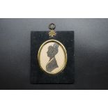 Two 19th century silhouettes, each with gilt highlights, largest 8.5 x 7cm oval; together with two