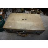 A vintage vellum or pig skin suitcase, 61.5cm wide.