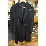 A 1920s Royal Navy officer's frock coat, by Gieves, labelled 'A.F.C Layard' and dated 1928.